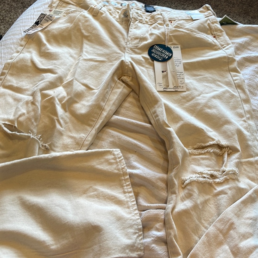 cream colored boyfriend jeans